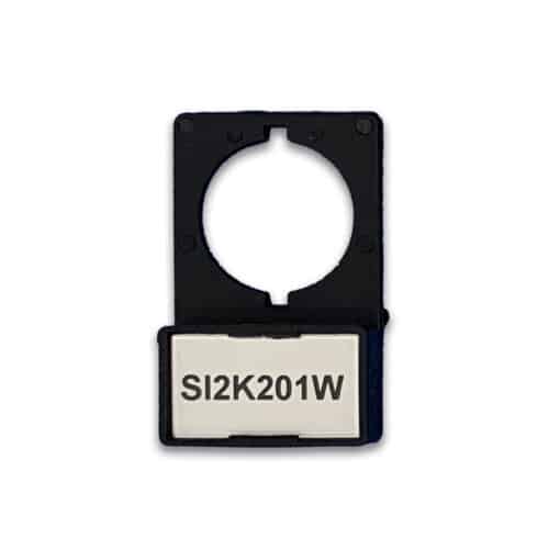 A black plastic push button holder with a circular top opening and a white tag with “SI2K201W” printed on it.
